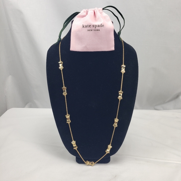 Kate Spade Gold Tone Take a Bow Long Necklace - Picture 1 of 5